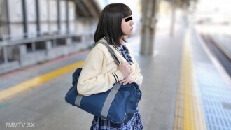A girl wearing a uniform is the goal of eating food.
